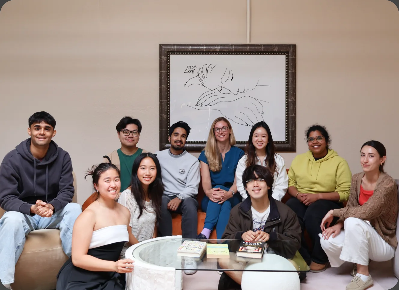 Clair team gathered together indoors